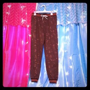 Grey sweatpants with rose gold stars
